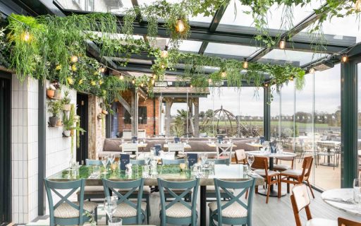 Airclos T6000 Retractable roof and E20 sliding glass walls. Outdoor dining room for The Lazy Pig in the Pantry Restaurant, Chesham, United Kingdom